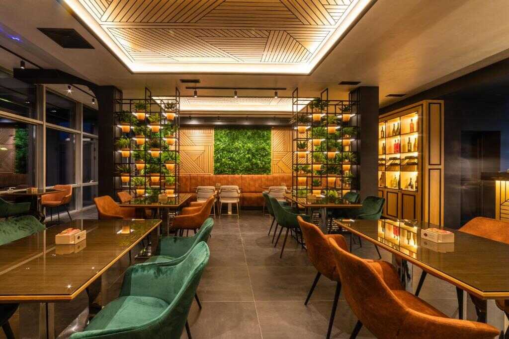 Restaurant interior of Hotel Luka's with wooden panelling and warm lighting